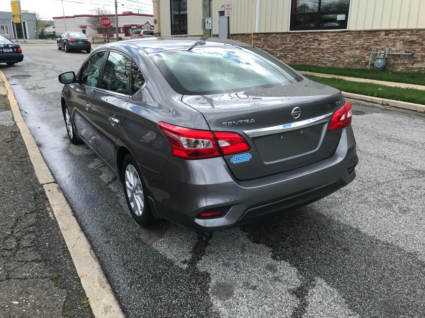 2019 Gray /Gray Nissan Sentra S (3N1AB7AP5KY) with an 1.8 V4 engine, Automatic transmission, located at 577 Chester Pike, Prospect Park, PA, 19076, (610) 237-1015, 39.886154, -75.302338 - Photo#2